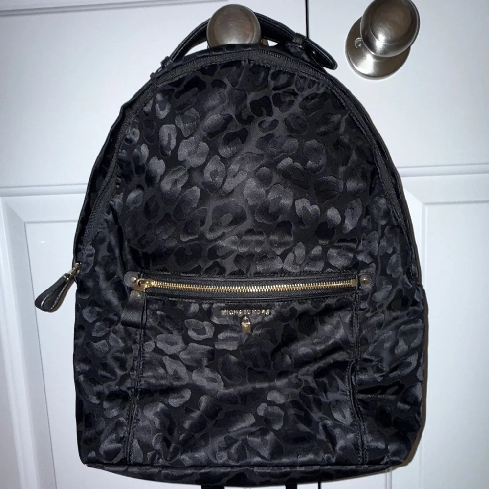 Michael Kors Black Animal Print Backpack - Picture 1 of 4